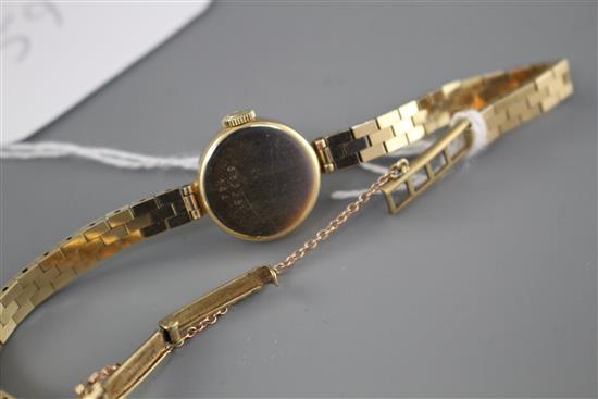 A ladys 1960s 9ct gold Fauve Leuba manual wind wristwatch, on a 9ct gold bricklink bracelet, gross weight 14.8 grams,